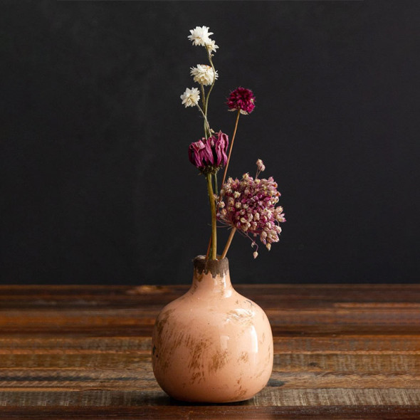 Vase en céramique rose veilli